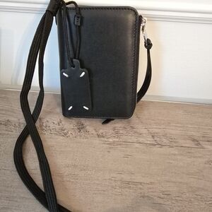 Women's pouch bag in black leather